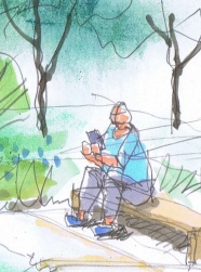 スマホを見る青年。